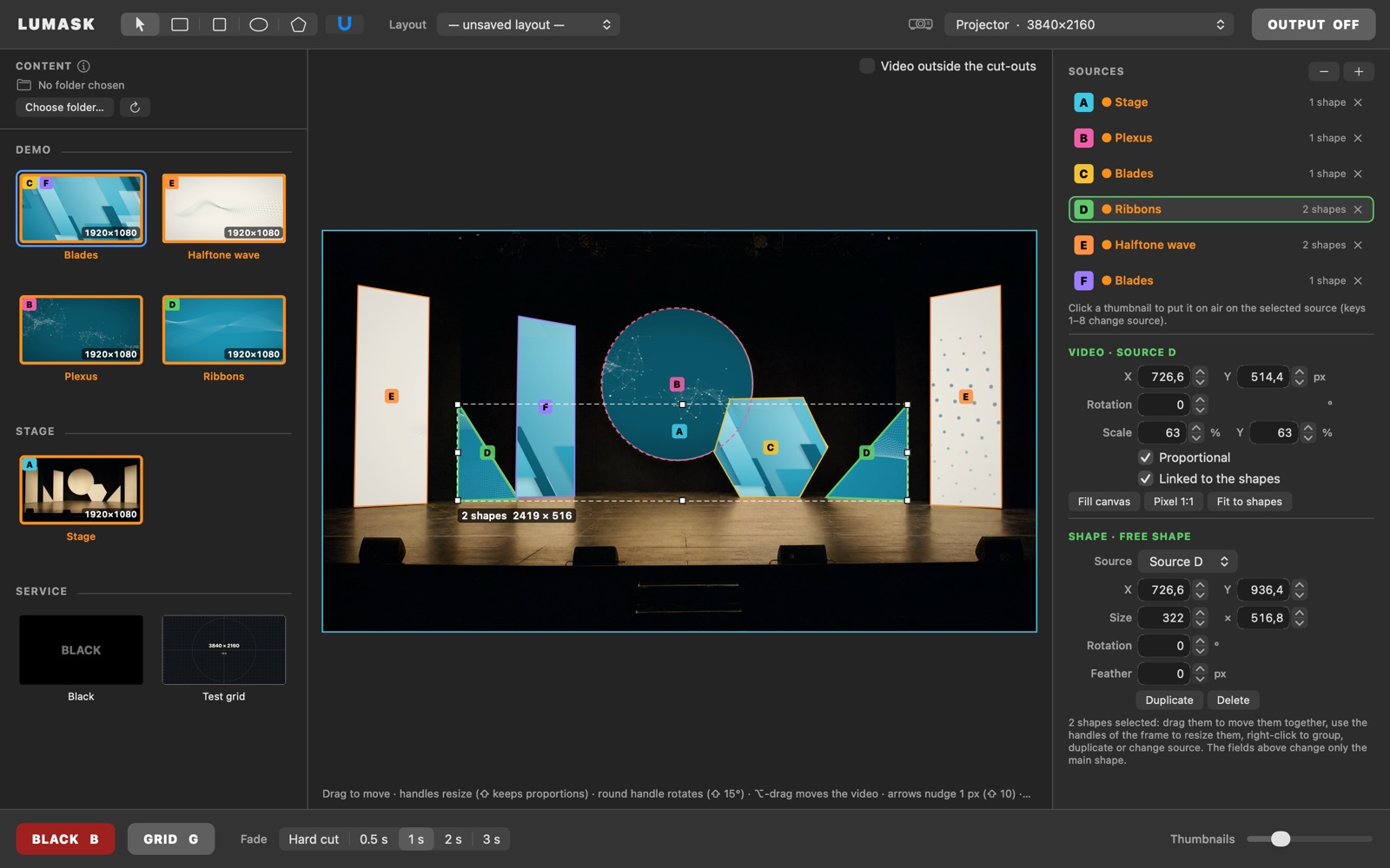 A mapping test on a stage set: circle, hexagon, triangles and panels, each with its own source